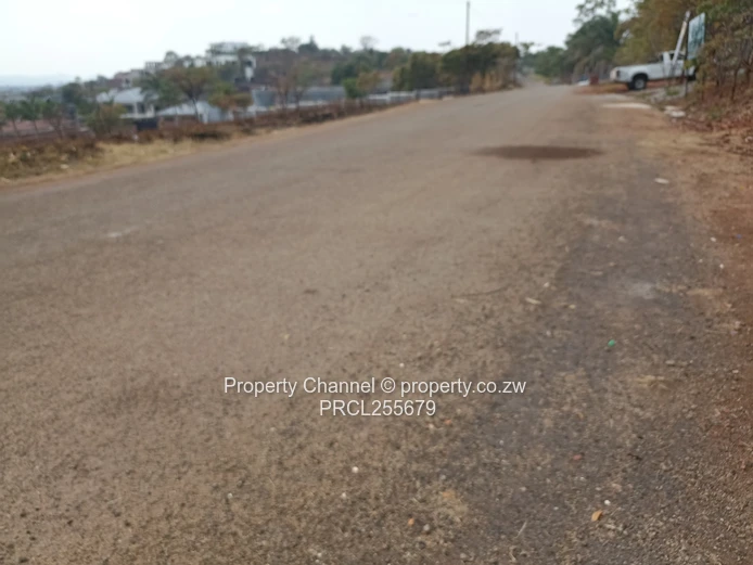 2,100m² Plot on Paved Road with Palm Trees, Hogerty Hill