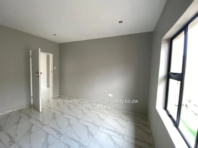 Modern 1-Bed Flat in Pomona, Harare North — Borehole