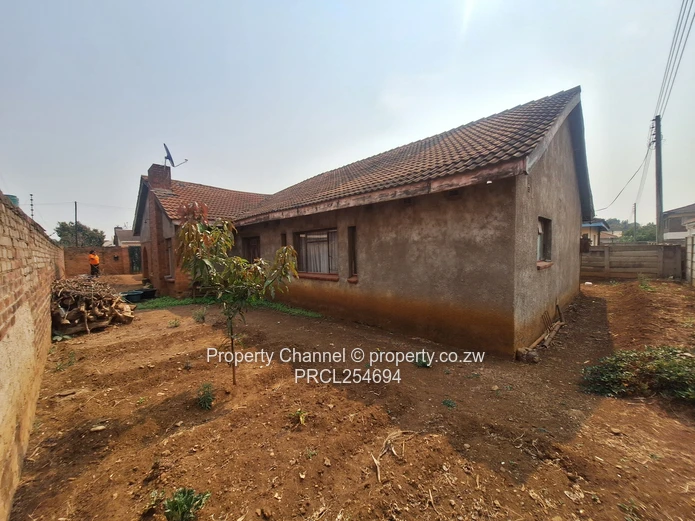 Solid 4-Bedroom Brick Home with Potential
