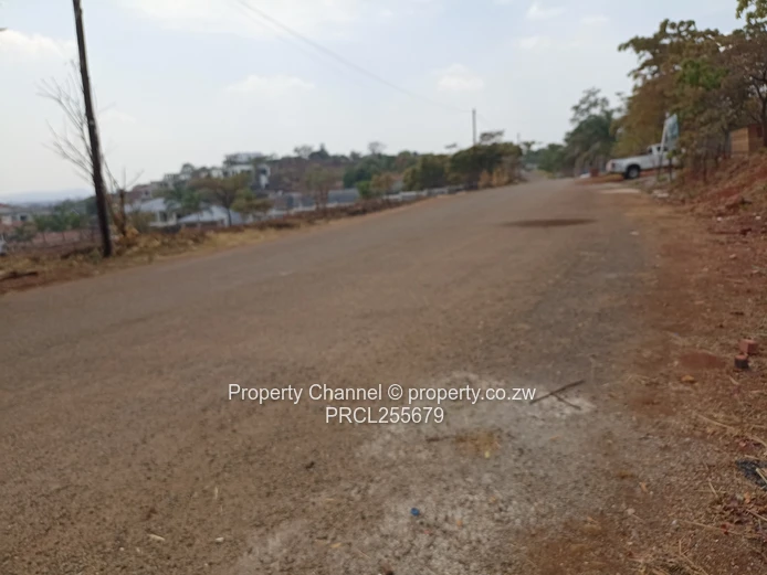 2,100m² Plot on Paved Road with Palm Trees, Hogerty Hill