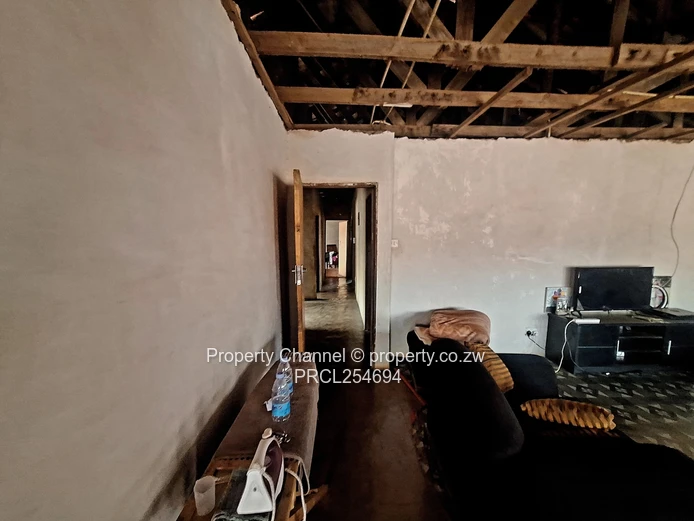 Solid 4-Bedroom Brick Home with Potential