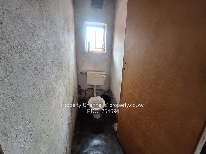 Solid 4-Bedroom Brick Home with Potential