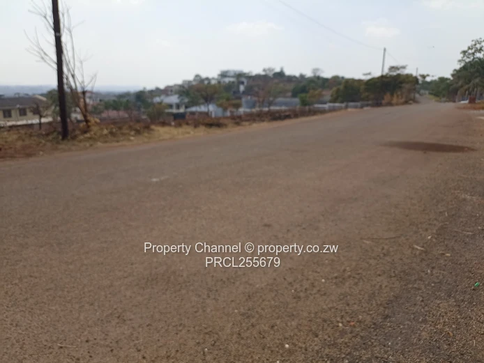 2,100m² Plot on Paved Road with Palm Trees, Hogerty Hill
