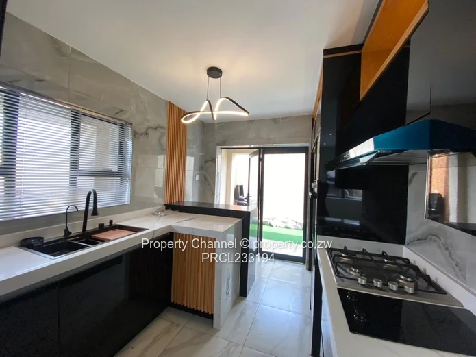 Modern 1-Bed Flat in Pomona, Harare North — Borehole